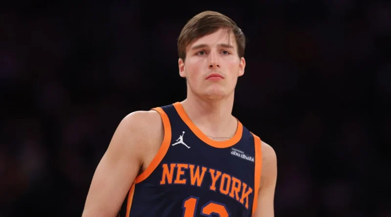 “New York Knicks guard Tyler Kolek handling the ball during a game as trade deadline rumors swirl.”
